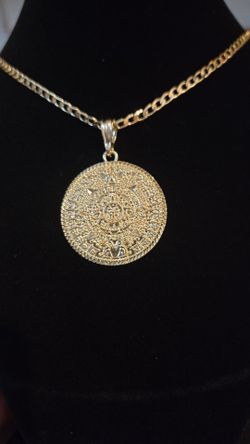 Aztec calendar pendant
