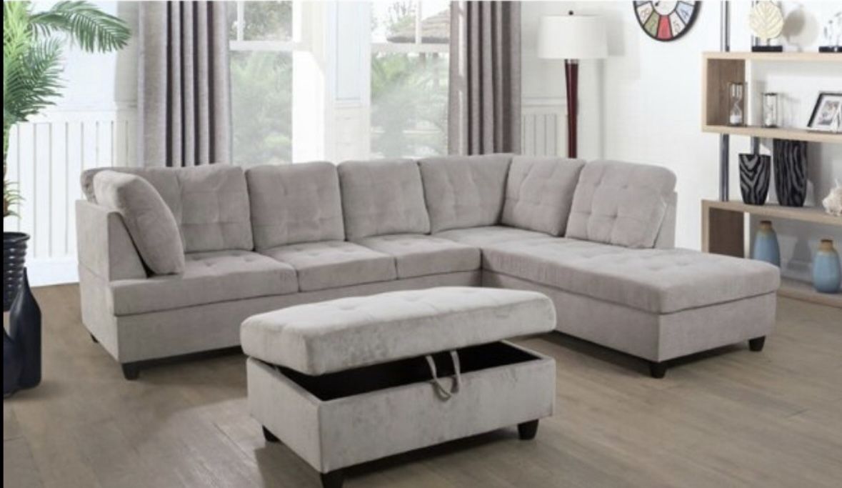 New Gray Chenille/Corduroy Sectional Sofa With Ottoman. New In Original Boxes