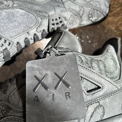 Air Jordan 4 Retro x KAWS Black (2017)