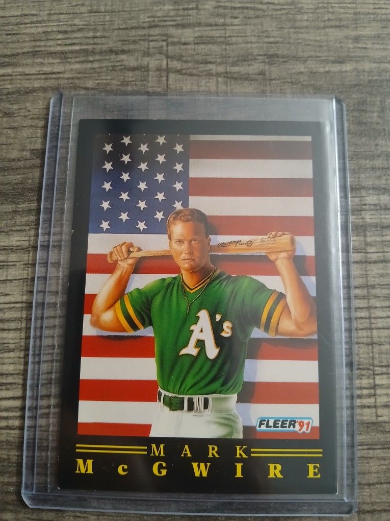 1991 Fleer Pro-Visions Mark McGwire baseball card, specifically card #4 in the set. This card features Mark McGwire in his Oakland A's Athletics