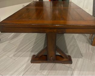 Butterfly leaf wood extension table