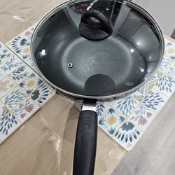 New 12in deep non stick wok like pan with glass cover.