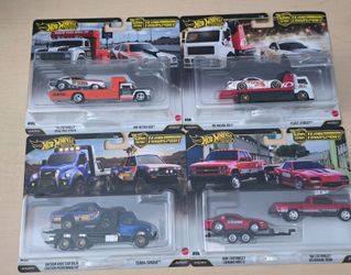NEW 2027 Hot Wheels Team Transport 4-Pack Set