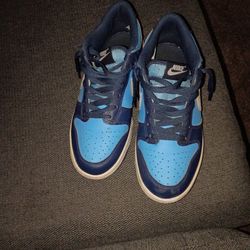 Dark and light blue Nike dunks lows