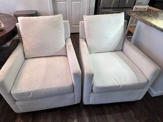 Pair of Off-White Swivel Glider Chairs