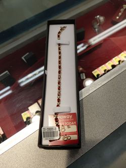 Garnet & diamond tennis bracelet