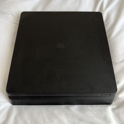 PS4 With 2 Controllers And 7 Game Discs