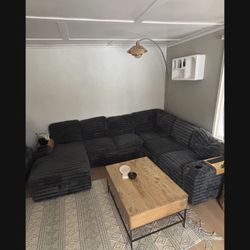 LOW PRICE MOVING-2900 + tax retail u shaped furry couch