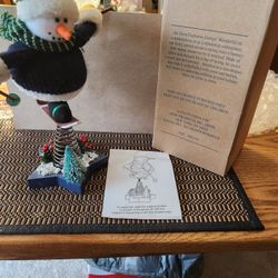 AVON SKIING BOUNCY SNOWMAN  W/ BOX