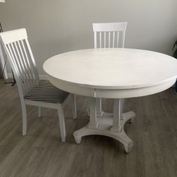 Round White Table And Two Chairs