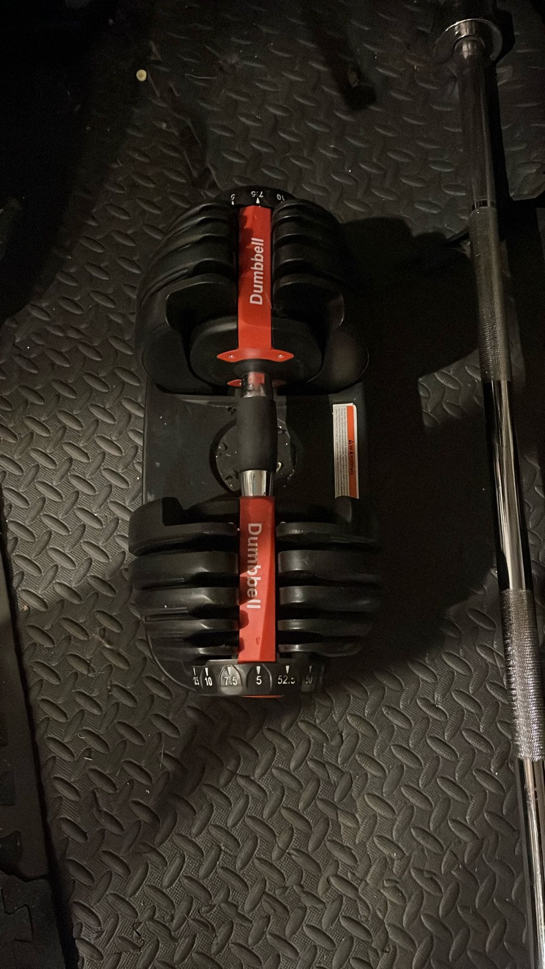1 Pair of adjustable dumbbells 5-52.5lbs