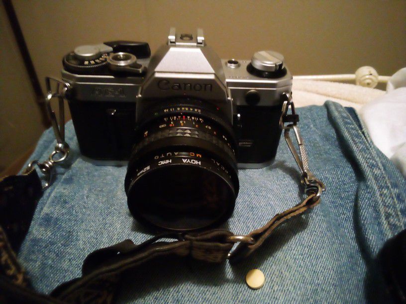Canon Ae1 35mm Camera With Cannon 50mm Lens And Hoya 52mm Lens