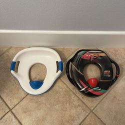 Potty Training Seat – Padded | World Grand Prix Cars Theme   Potty training seat in great condition, featuring a fun World Grand Prix Cars theme — per