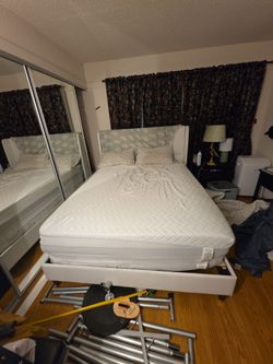 Queen size mattress and bedframe.