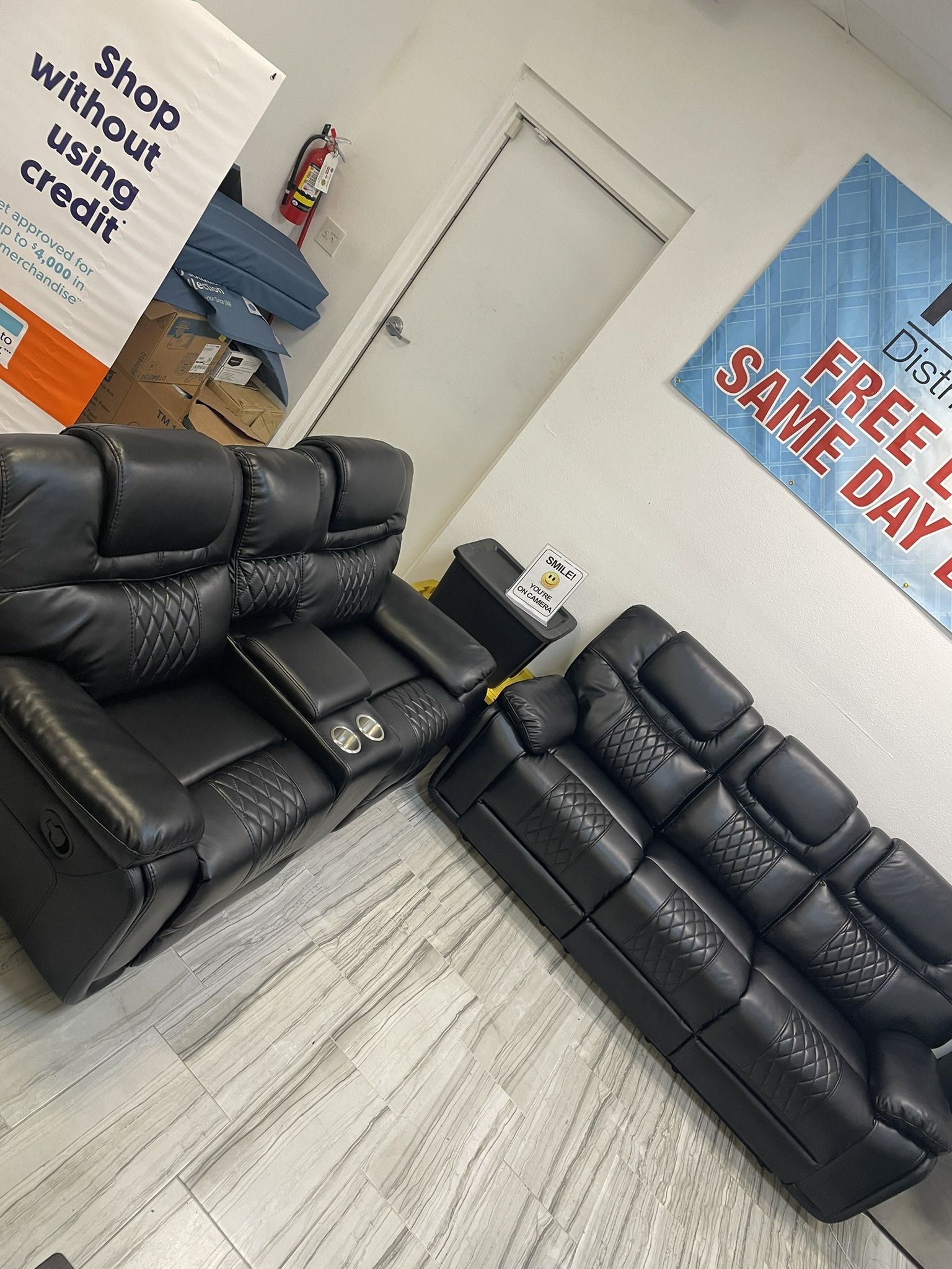 Summer clearance sale. Santiago black leather reclining sofa and loveseat set only $1099. Easy finance option. Same day delivery.