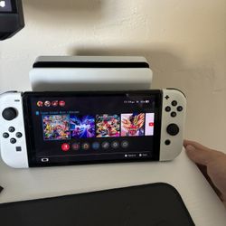 Nintendo Switch OLED Display With Smash Bros AND 200gb Micro SD Card for Extra Storage + More Below