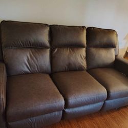 Beautiful Ashley furniture Brown leather manual reclining couch - $400 (Brooklyn Park)