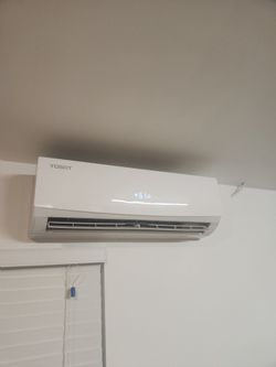 $100 Split type air conditioner 12000BTU.