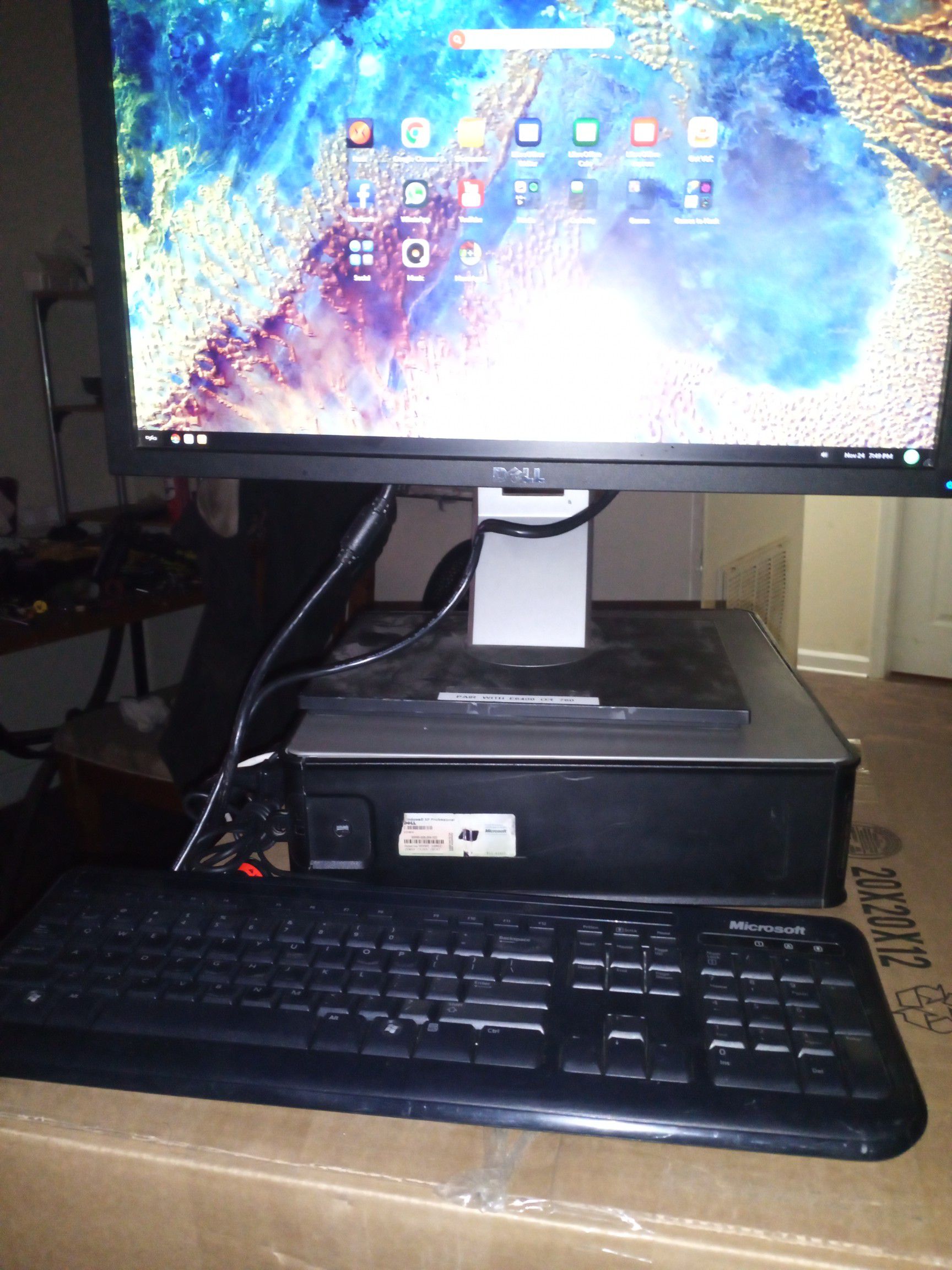Dell computer desktop with webcam and headphones