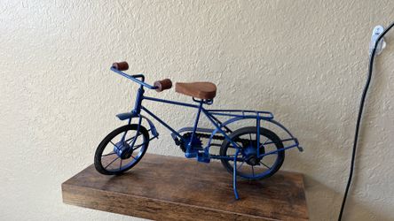 Vintage style blue metal bicycle model