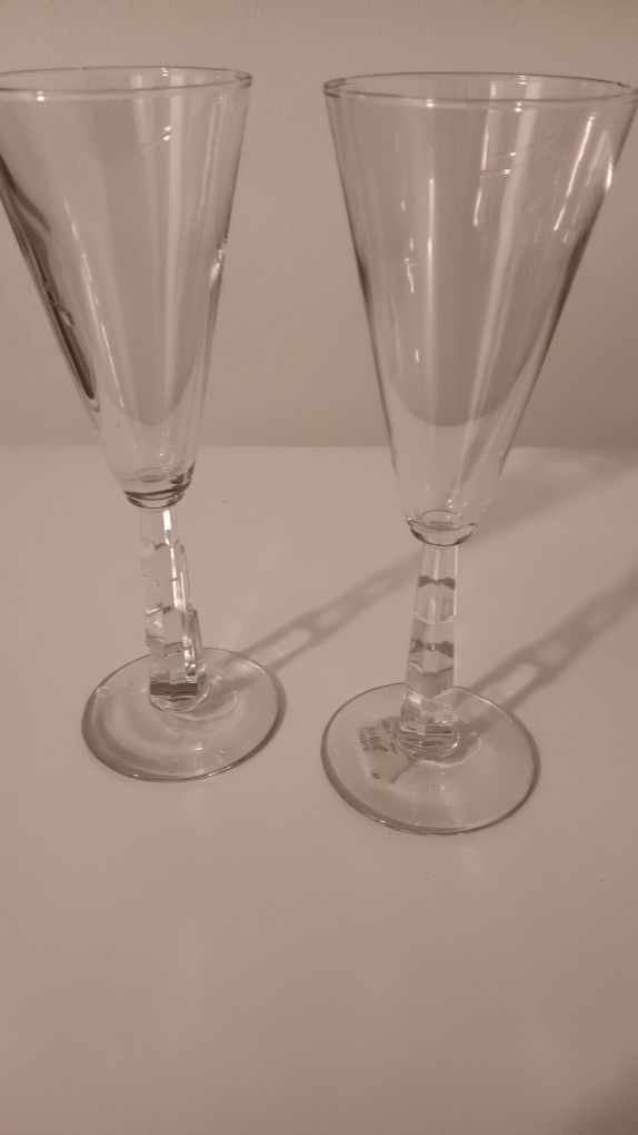 Champagne Glasses And Wedding Plates
