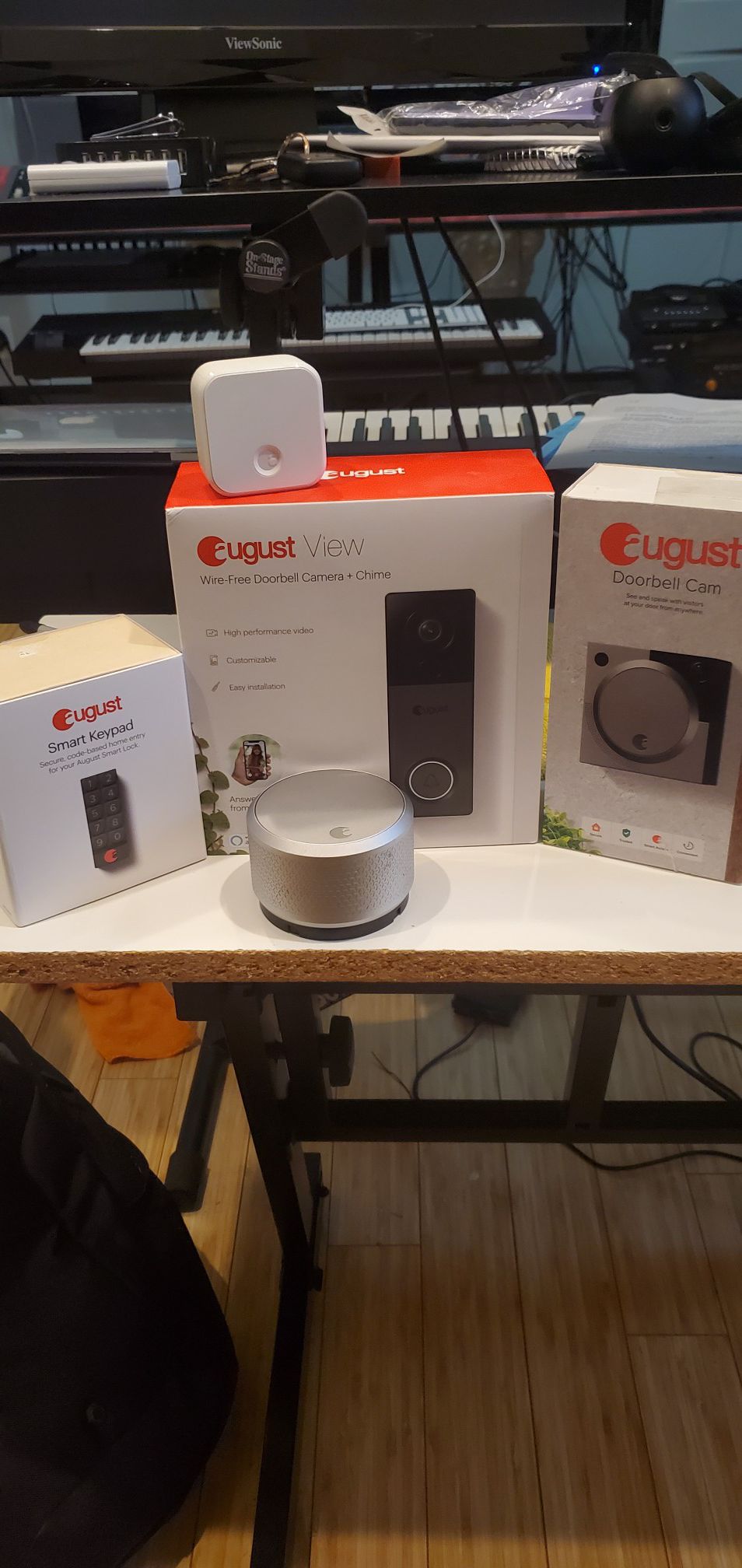August Smart Door Lock, Key pad, Doorbell cam, and Wire-free Doorbell cam + Chime and wifi hub