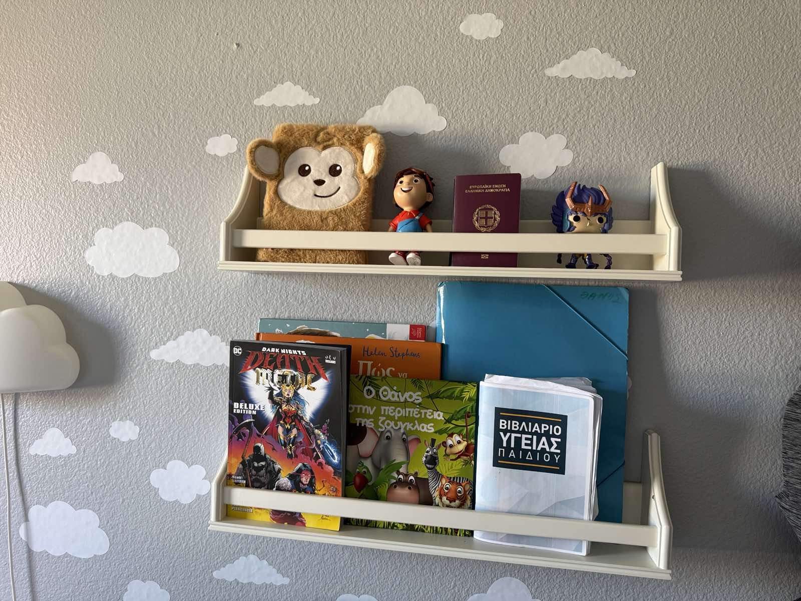 2 White wooden shelves mounted directly to wall