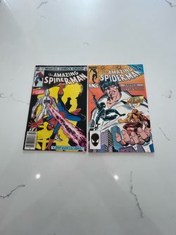 Amazing Spider-Man #242(VG) and 273 (VG/FN) Marvel Comics, Beyonder, Puma, Thinker, Secret Wars II