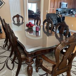 Long dining table , 6 seater with glass protector