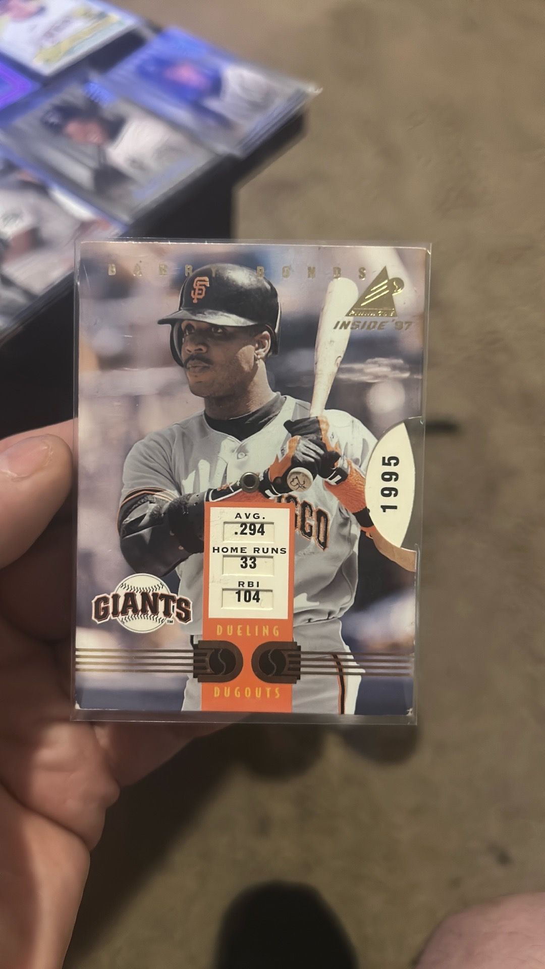 Baseball card Barry bonds and other side is Albert Belle