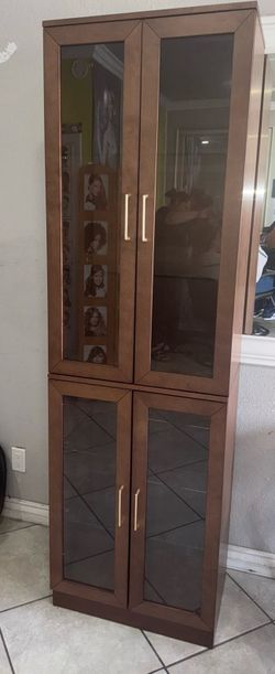 Four door walnut china cabinet Kinn Furniture