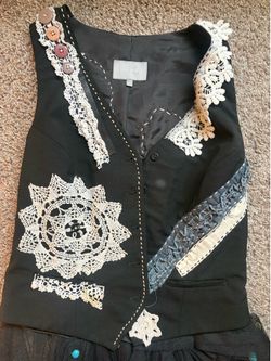 Custom embroidery vest with poofy tail