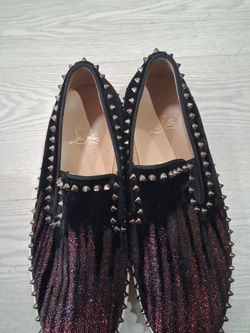 Like new red bottom studded Louboutin