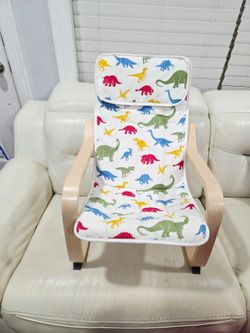 IKEA POÄNG Kid's armchair, birch veneer/Medskog Dinosaur Pattern.