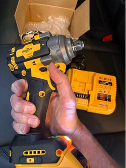 1/2 inch impact with the battery and the charger Dewalt compatible