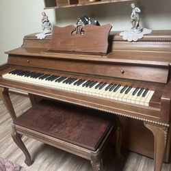 Upright Piano And bench