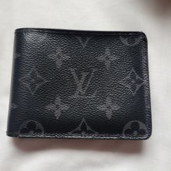 Louis Vuitton Wallet  .  Authentic 