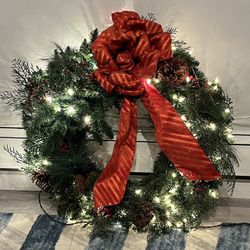Lighted indoor outdoor Christmas holiday wreath. 27 inches wide.