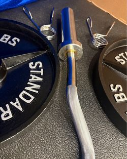 NEW Olympic Equipment Curl Bar of 20# with Cooper Bearings and Plates 2X35s, 2X25s, 2X10s and 2X5s pounds. Brute 170#