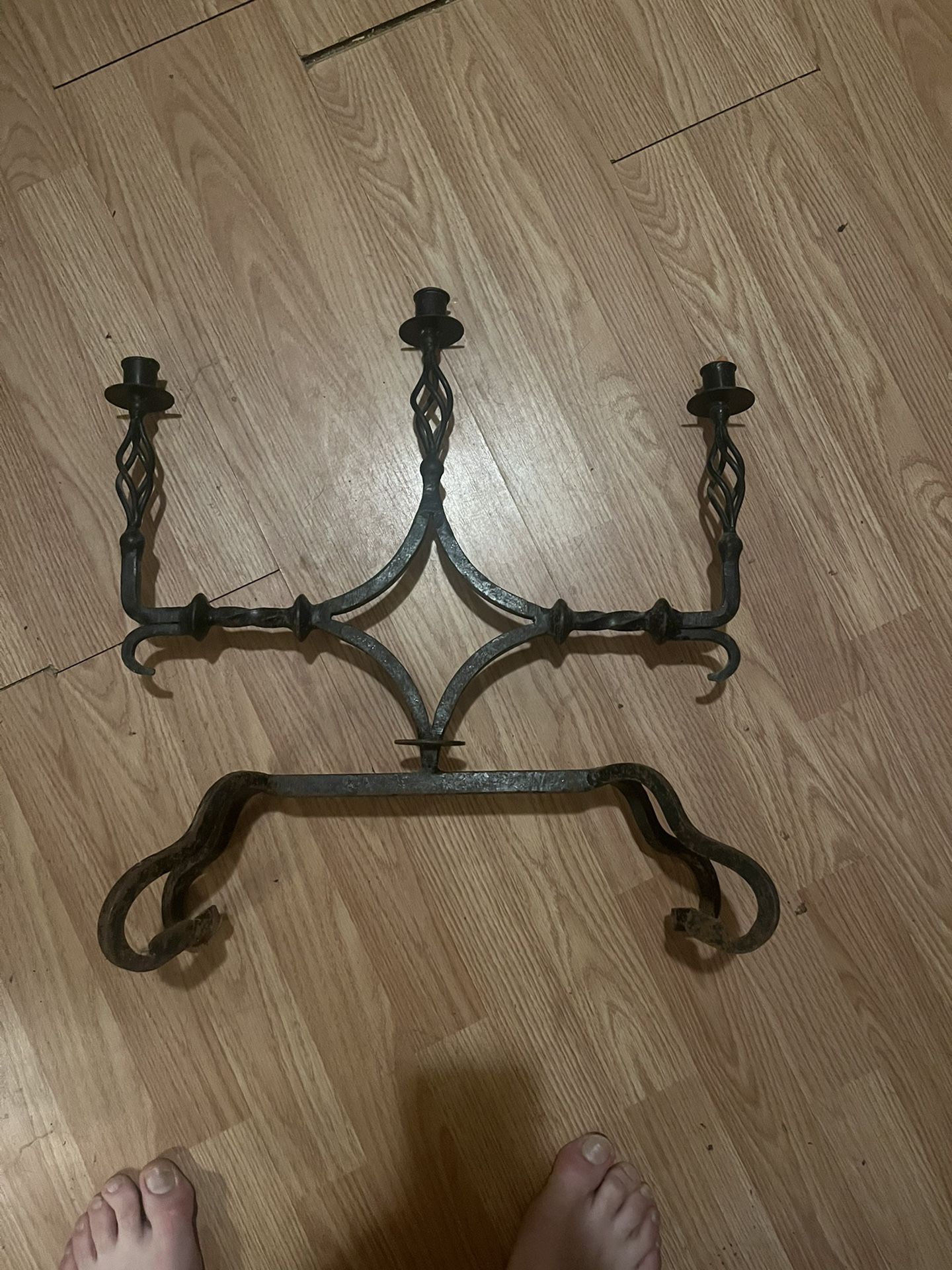 Antique wrought iron candelabra and basket