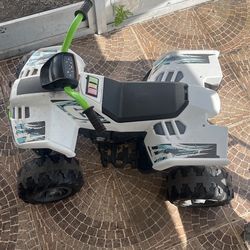kid battery powered 4 wheeler