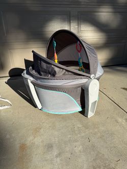 Fisher Price travel bassinet and play space