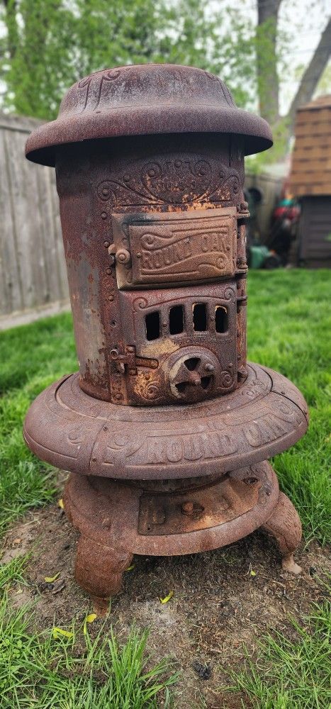 Antique Round Oak Pot Belly Stove