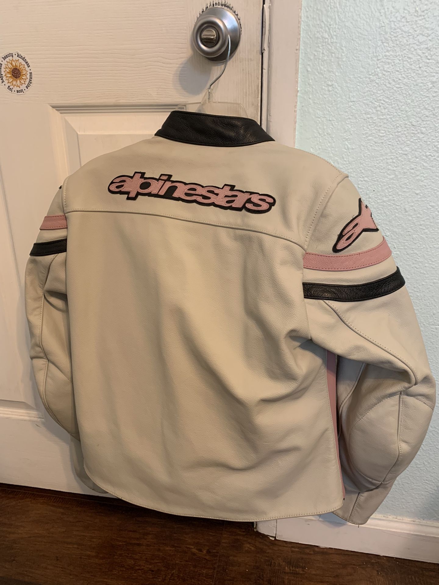 Alpinestars Stella Womens Pink/White/Black Leather Motorcycle Jacket. Size 6. Padding on shoulders and elbows. Gently used condition, no flaws, no rip