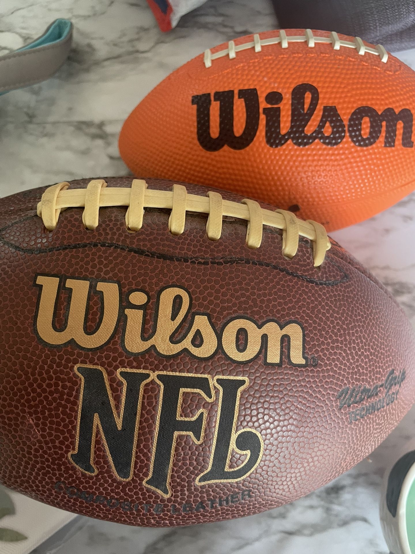 2 Autographed Footballs 20$