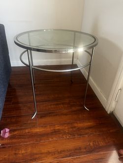 Glass display tables