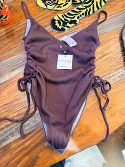 NWT chocolate ripped one piece