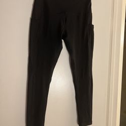 N. X. L. Lagging’s with pockets on the side, size L