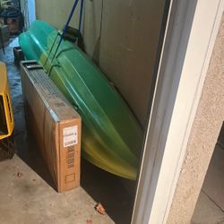 Kayak With Oars And Vest