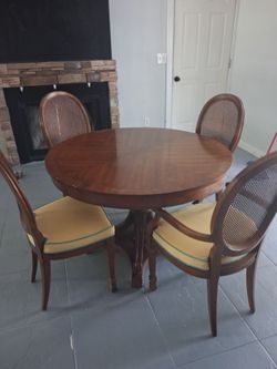 Round Wood Dining Table, extention to sit 6  with 6 Cane Back Chairs